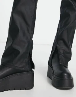Petite*Stradivarius Petite Coated Flare Jean With Split Hem Detail In Black